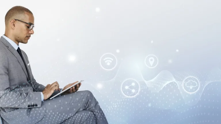 Businessman using tablet with digital icons representing loan tech solutions.