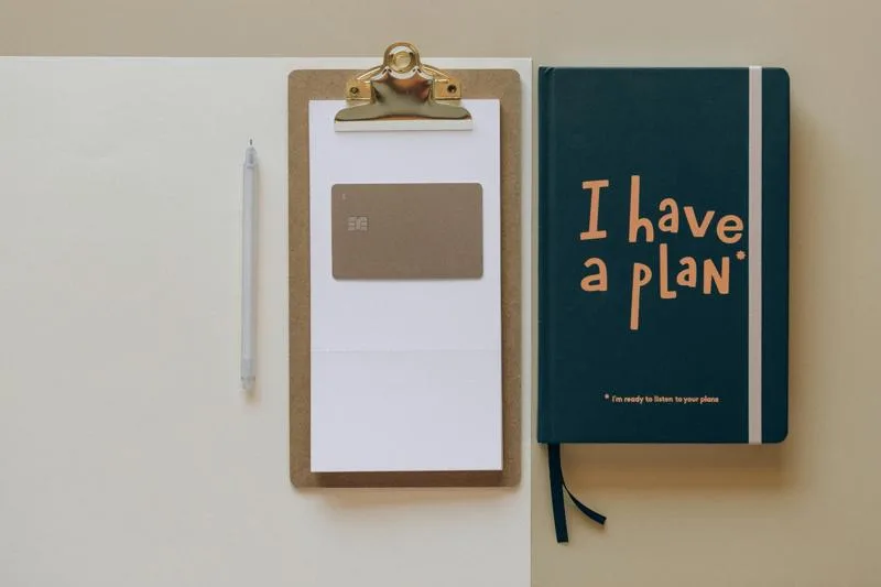 Clipboard, credit card, and planner symbolize tracking and planning tools