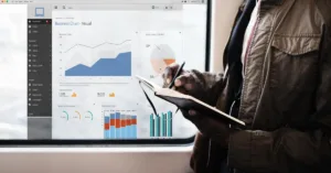 Key features of loan management software shown with visual overlay.
