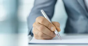 Close-up of legal contract document representing loan covenant agreements.