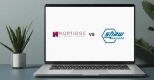 The Nortridge Loan Software logo vs Shaw Systems logo side by side, displayed on a laptop sitting on a desk with plants beside it.